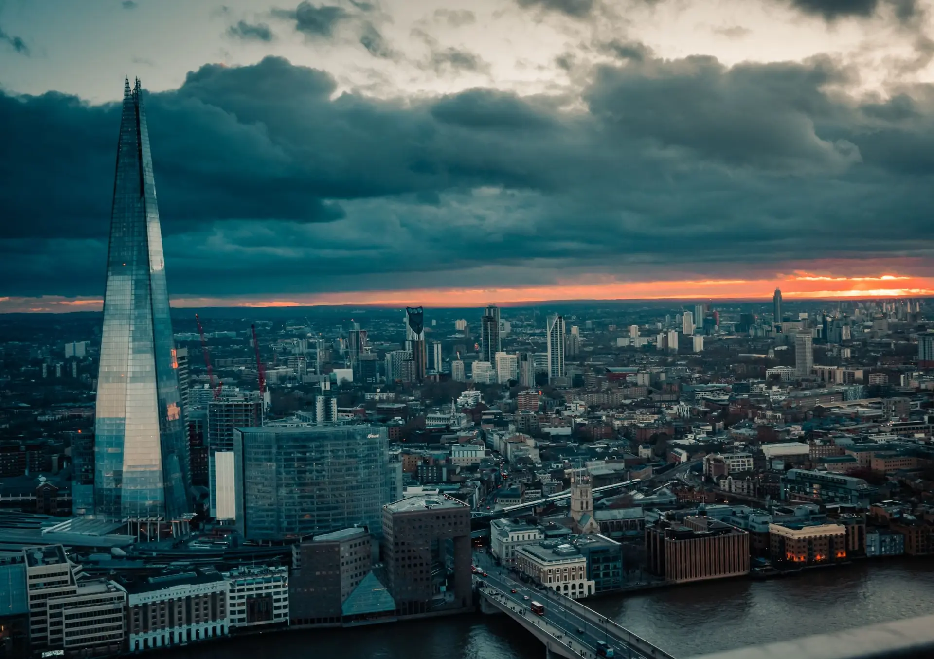 London skyline along the River Thames at dusk