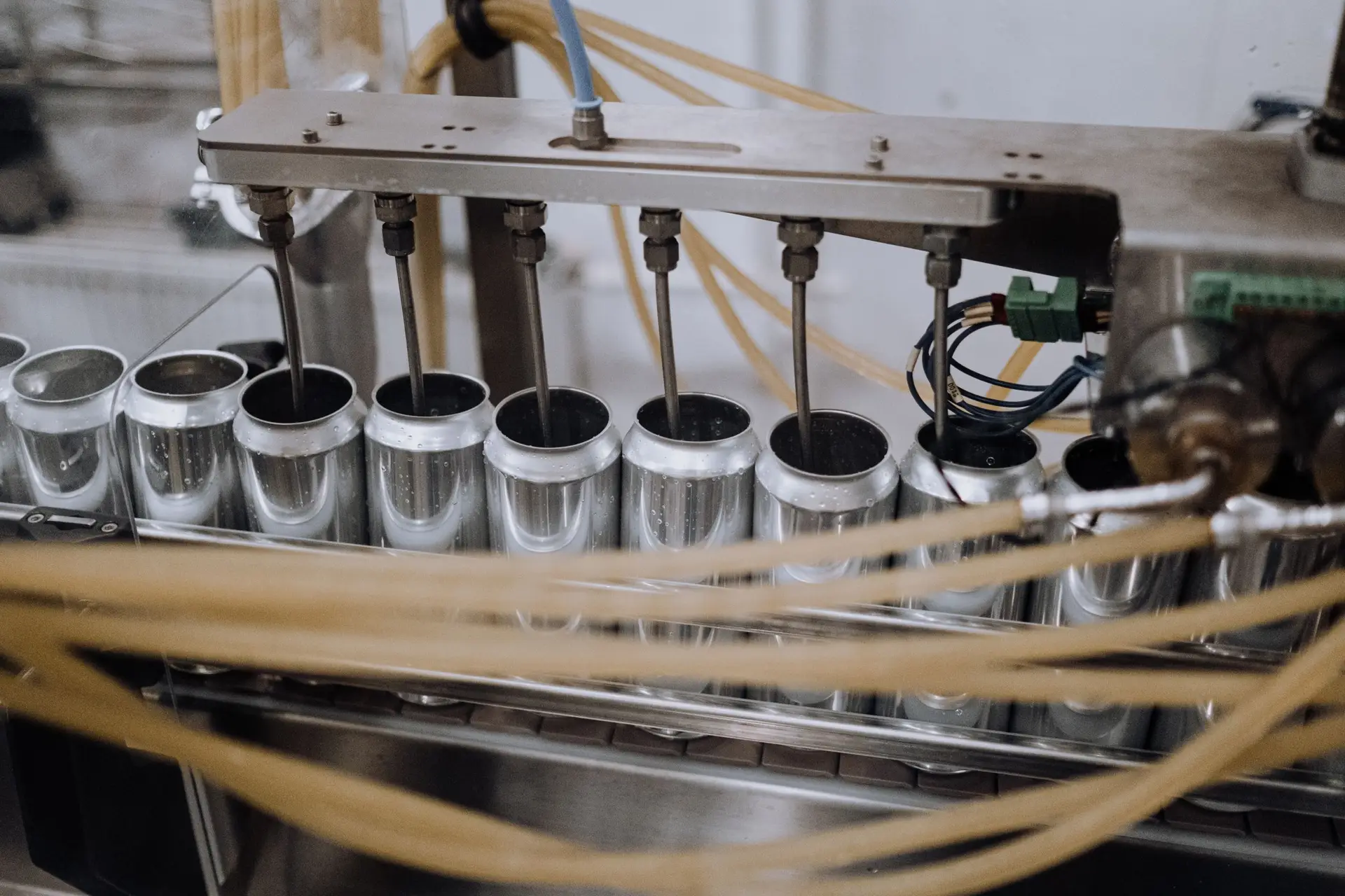Automated production line filling consumer goods containers