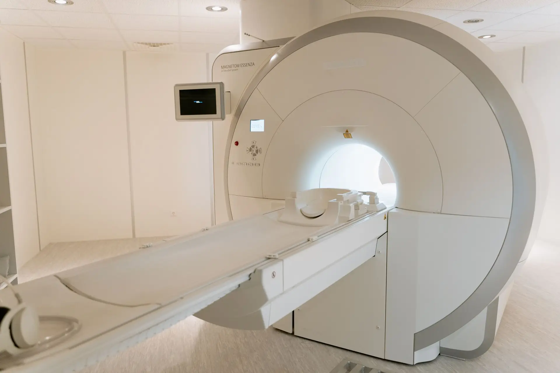 Modern MRI scanner in a bright hospital imaging suite