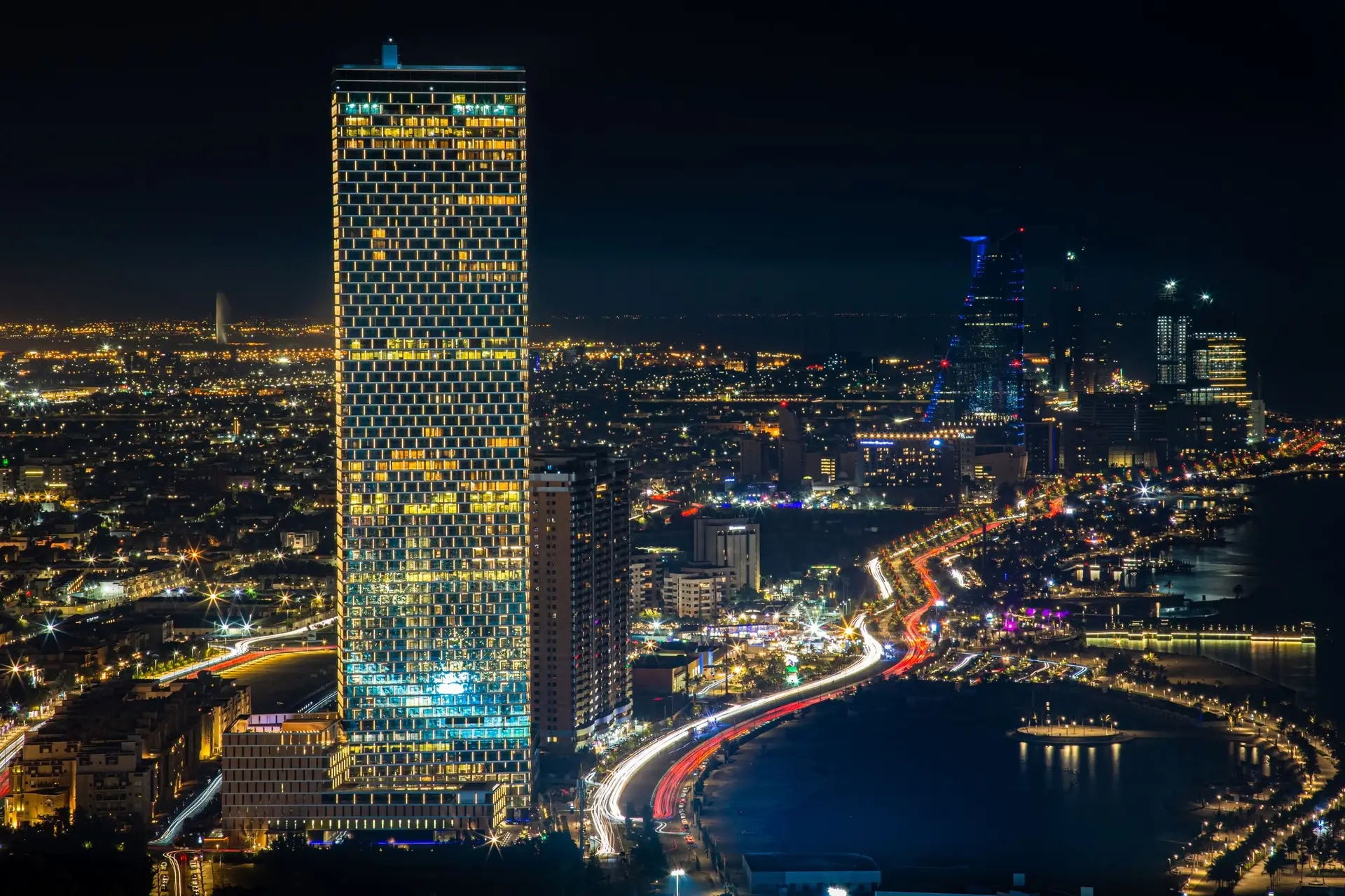 Jeddah skyline and coastline illuminated at night